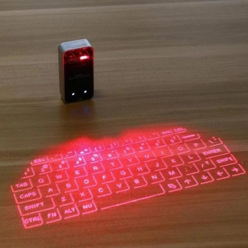 Laser Tastatur: Kompakt und kabellos für unterwegs-Erleben Sie die Zukunft mit der Laser tastatur, die eine vollwertige auf jede flache Oberfläche projiziert. Bestellen Sie jetzt und tippen Sie überall!
